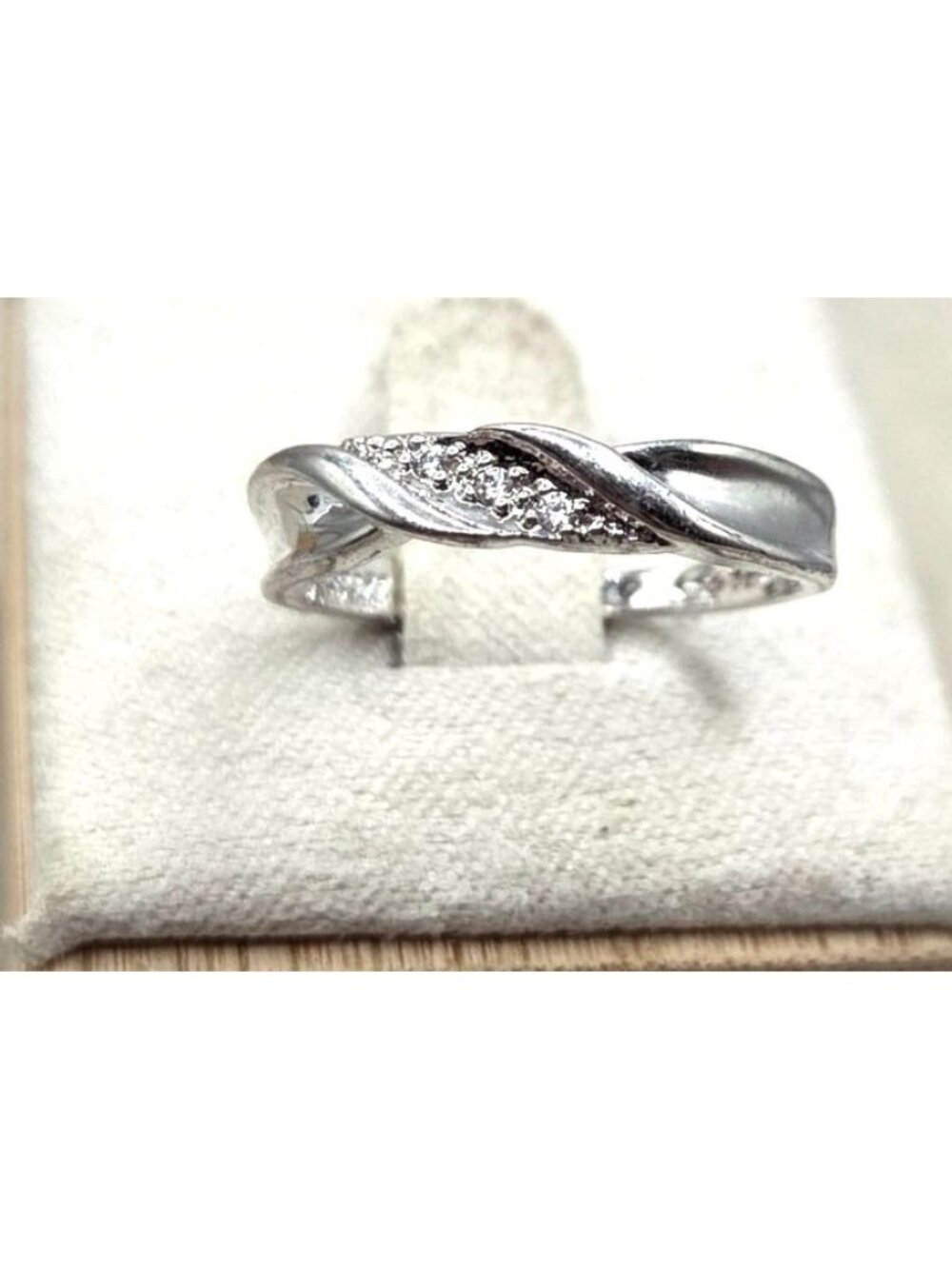 Silver Tone Twisted Band Ring With Cubic Zirconia Accents